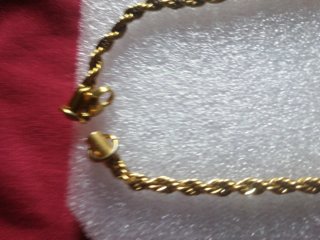 Collana uomo acciaio dorato intrecciato