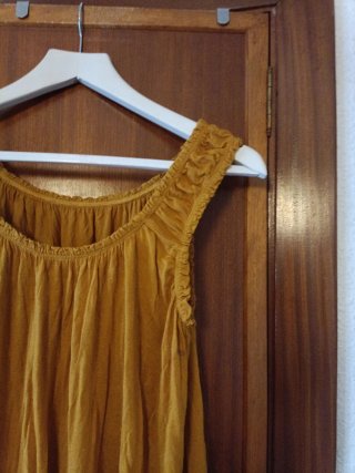 Blusa mostaza sin mangas