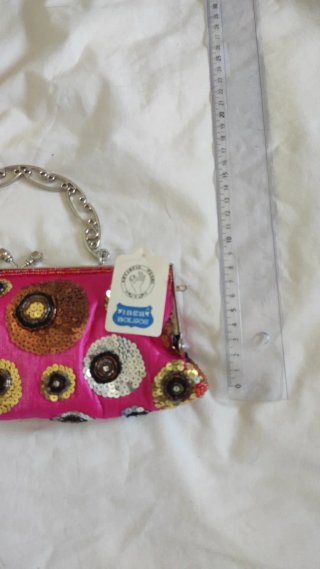 Bolso de fiesta rosa con lentejuelas