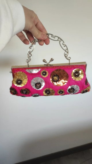 Bolso de fiesta rosa con lentejuelas