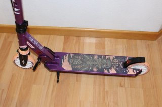 Patinete Oxelo niña morado. Como nuevo