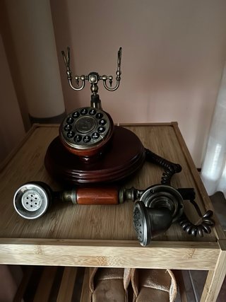 Teléfono antiguo de disco botonera