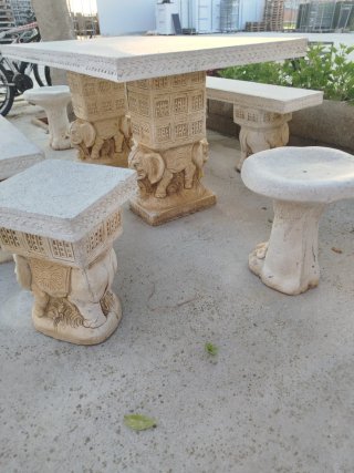 Conjunto terraza piedra mesa y bancos