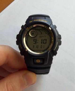 Reloj Casio G-Shock azul marino y amarillo