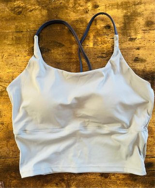 Top deportivo azul talla L.