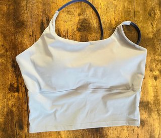Top deportivo azul talla L.