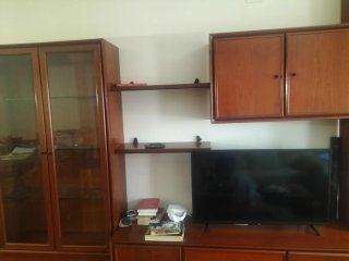 Mueble de salón madera y cristal