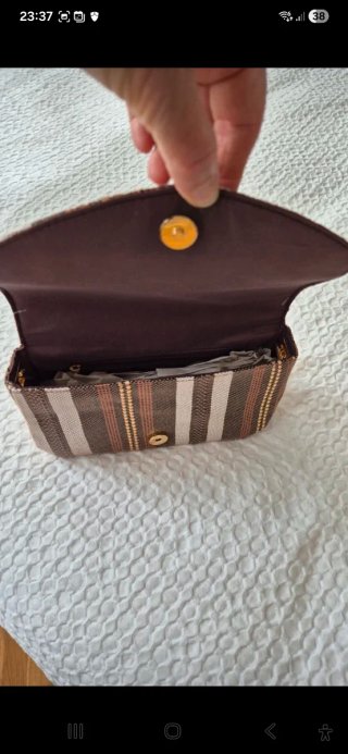 Bolso Sfera rayas tipo clutch