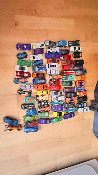 Garaje hot wheels mas lote de coches