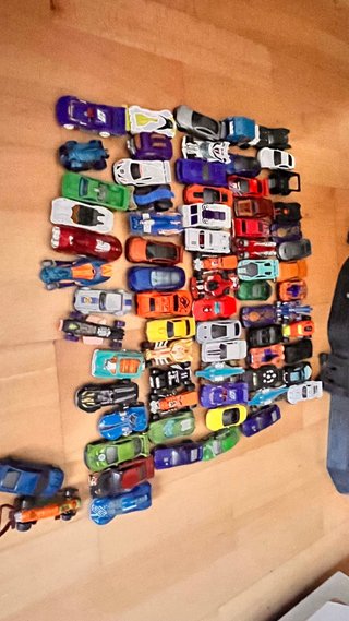 Garaje hot wheels mas lote de coches