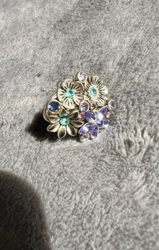 Anillo ajustable flores morado y turquesa