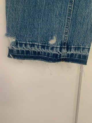 Pantalón vaquero ancho desgastado