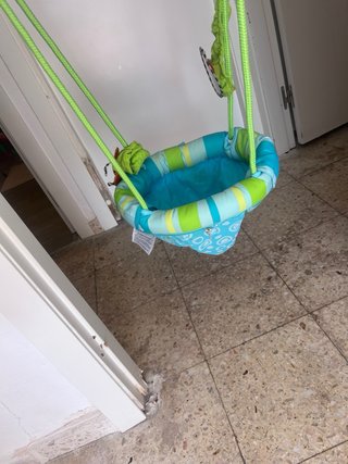 Columpio para bebé con juguetes nuevo