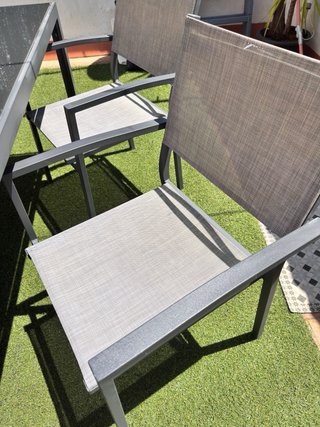 Conjunto de mesa de cristal y 4 sillones de jardín