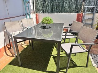 Conjunto de mesa de cristal y 4 sillones de jardín