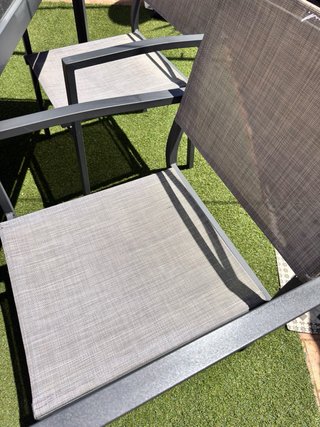 Conjunto de mesa de cristal y 4 sillones de jardín