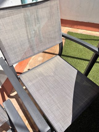 Conjunto de mesa de cristal y 4 sillones de jardín