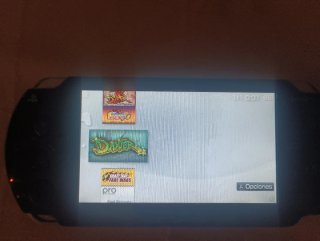 PSP 1000 Negra + colección de Juegos + cargadores