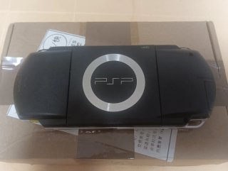 PSP 1000 Negra + colección de Juegos + cargadores