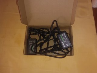 PSP 1000 Negra + colección de Juegos + cargadores