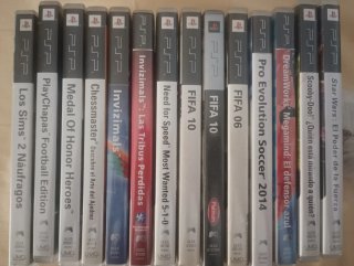 PSP 1000 Negra + colección de Juegos + cargadores