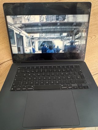 MacBook Air M2 15" · Midnight · Como nueva