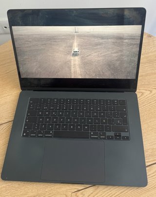 MacBook Air M2 15" · Midnight · Como nueva