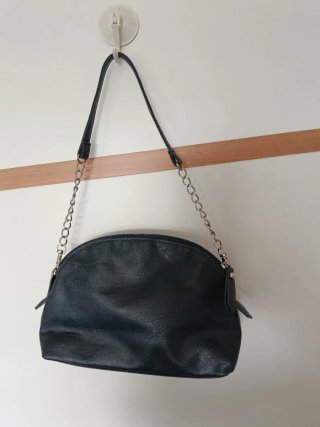 Bolso elegante azul con volantes
