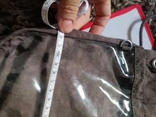 Mochila transparente marrón,kipling