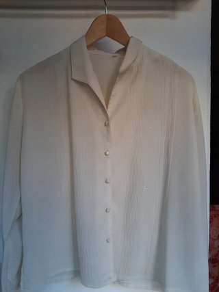 Blusa beige elegante