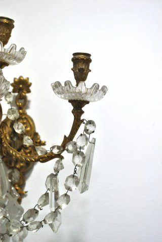 Antiguos apliques de bronce y cristal