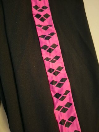 Pantaloni sportivi Arena neri con banda rosa