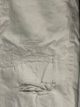 Bermudas vaqueras blancas rotas