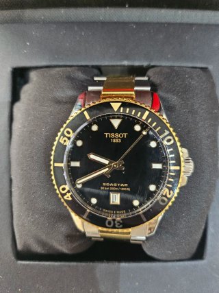 Tissot Seastar 1000 Negro y Dorado Zafiro Bicolor
