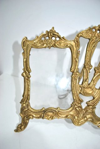 Antiguo portafotos de bronce