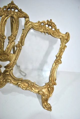 Antiguo portafotos de bronce