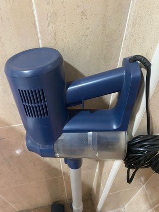 Aspirador de mano azul