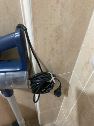 Aspirador de mano azul
