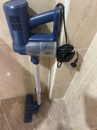 Aspirador de mano azul