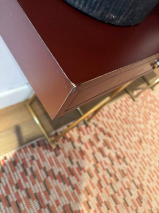 Aparador de estilo oriental con patas doradas