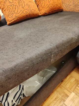 Sofá chaiselongue marron  y naranja