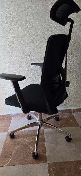 Sillón de oficina ergonómico con ruedas
