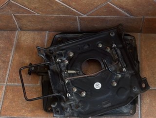 Base giratoria para asiento de vehículo