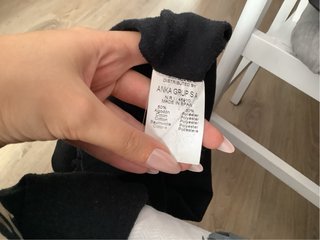 Jersey negro cuello alto manga larga