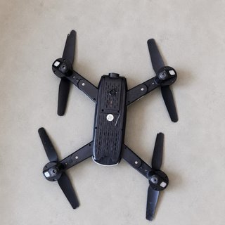 Drone SG700 con mando y accesorios