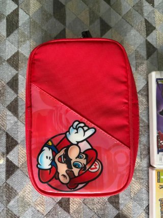 Nintendo 2DS + 8 Juegos + funda Mario + cargador