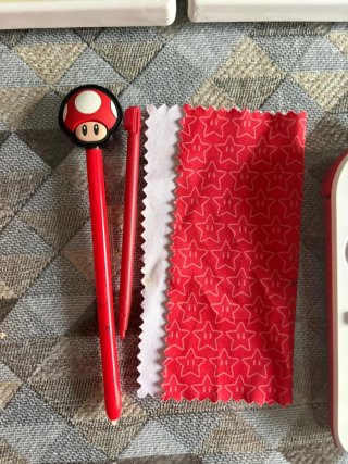 Nintendo 2DS + 8 Juegos + funda Mario + cargador