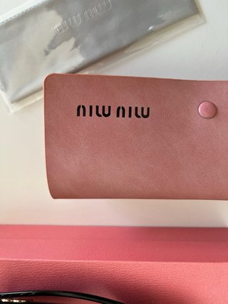 Occhiali da sole Miu Miu donna neri e dorati