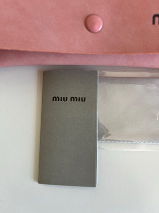 Occhiali da sole Miu Miu donna neri e dorati