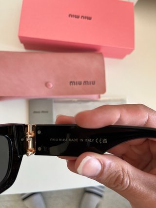 Occhiali da sole Miu Miu donna neri e dorati